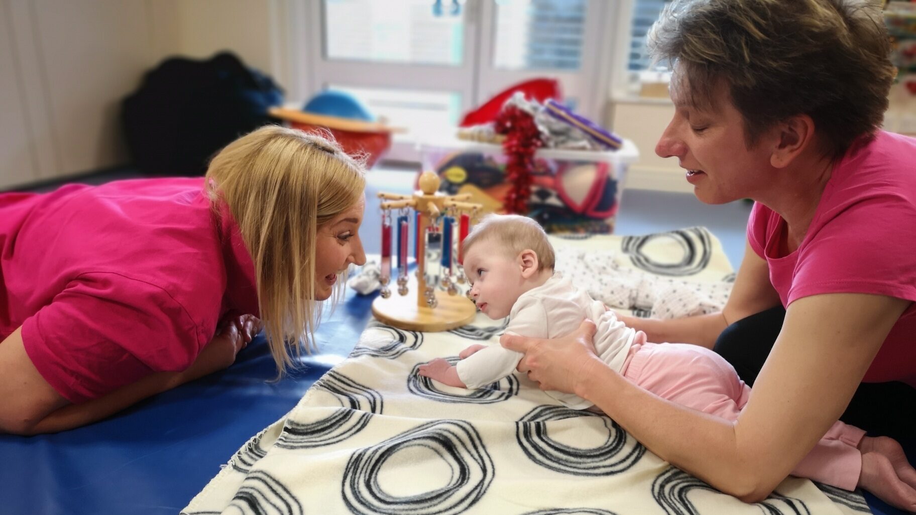 Pace therapists working with a child with a neurodisability