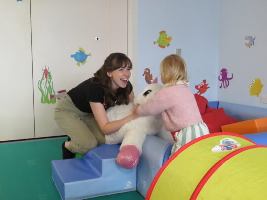 Occupational therapist in a session with a child